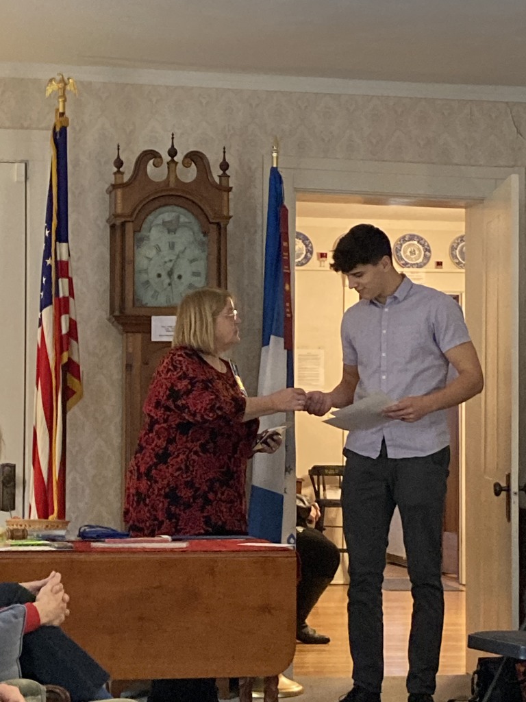 Rock County Christian School student receiving an award