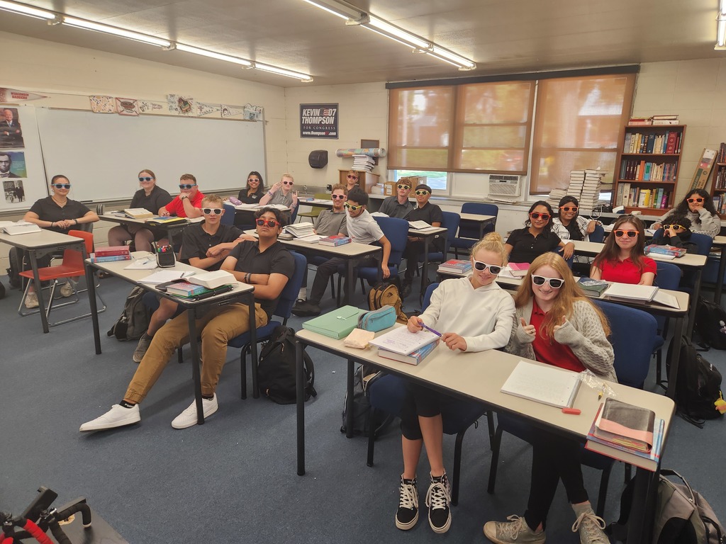 Rock county christian students wearing shades as they learn about  their world view